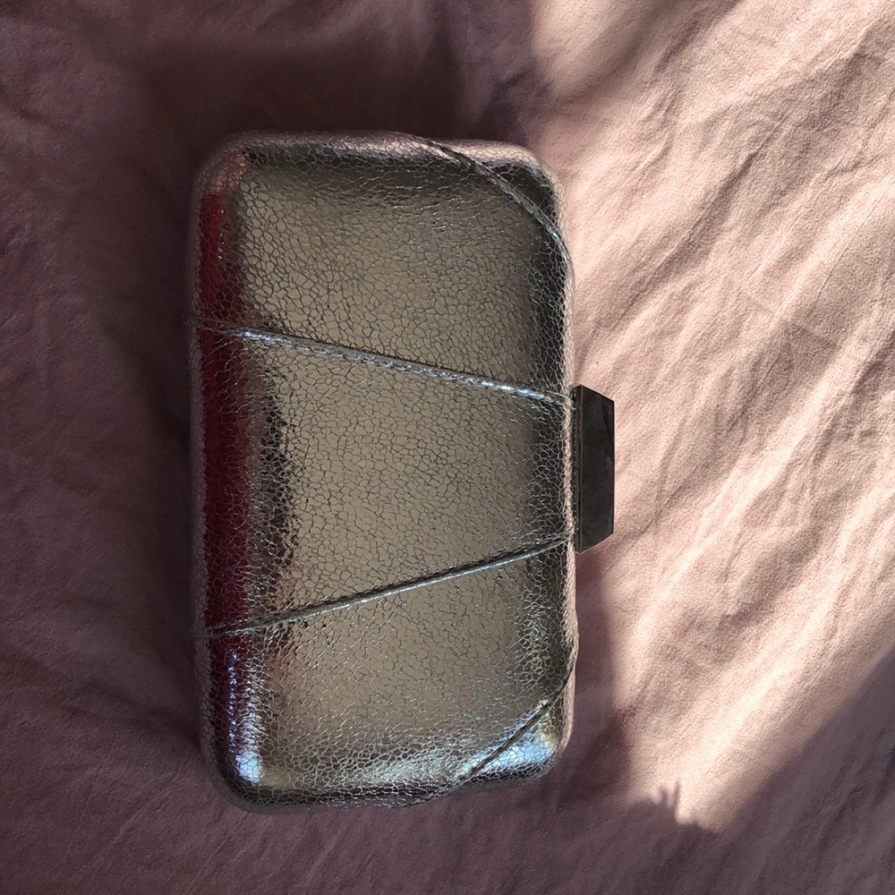 Silver cross body clutch